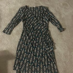 Beatiful green dress with black and gold design.